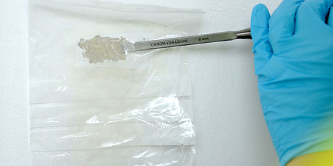 Sampling asbestos in a wall