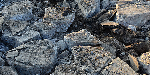 Broken pieces of asphalt at a construction site